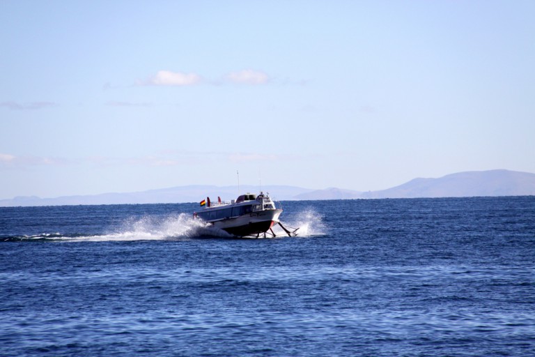 Our four hydrofoils sped off across Lake Titicaca.