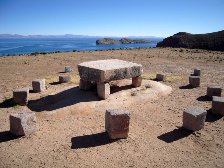 Here is the stone table and seats across from the Sacred Rock. The Isla de la Luna is in the background.