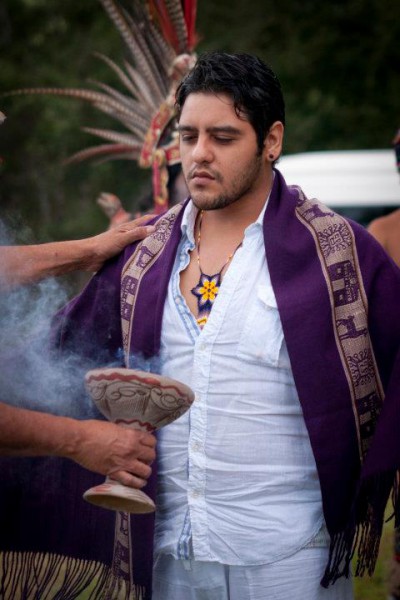 An Xahel is purified with the sacred fire.