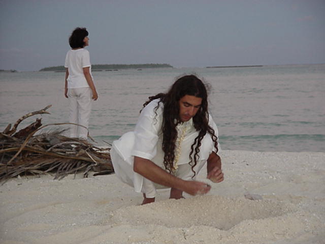 Ataana Loa of Turkey prepares the pit for our sacred fire.
