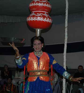 This amazing dancer usually does this dance with 12 pots on top his head, but our tent only had room for 11....