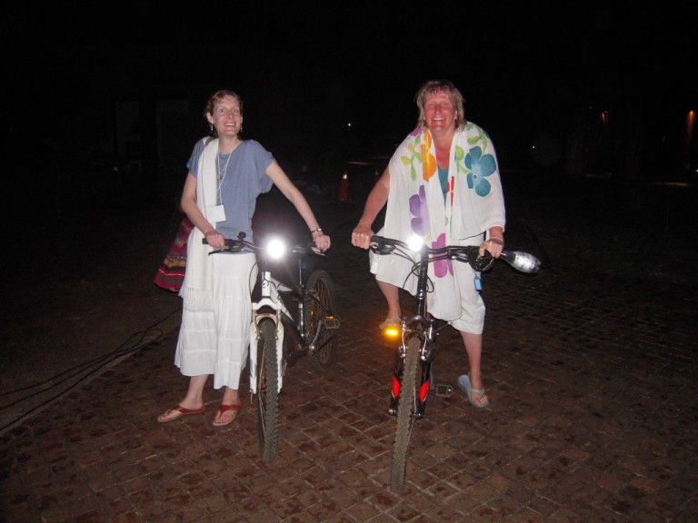 Alanah and Laya rode bicycles to their nightly swim in the ocean.