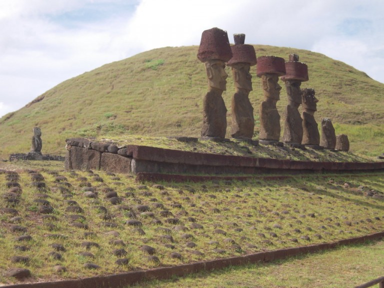Anakena Moai with ancient Moai on left.
