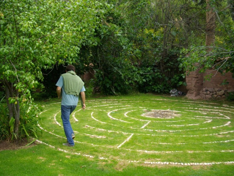 Felipe enters the hidden labyrinth in the back garden.